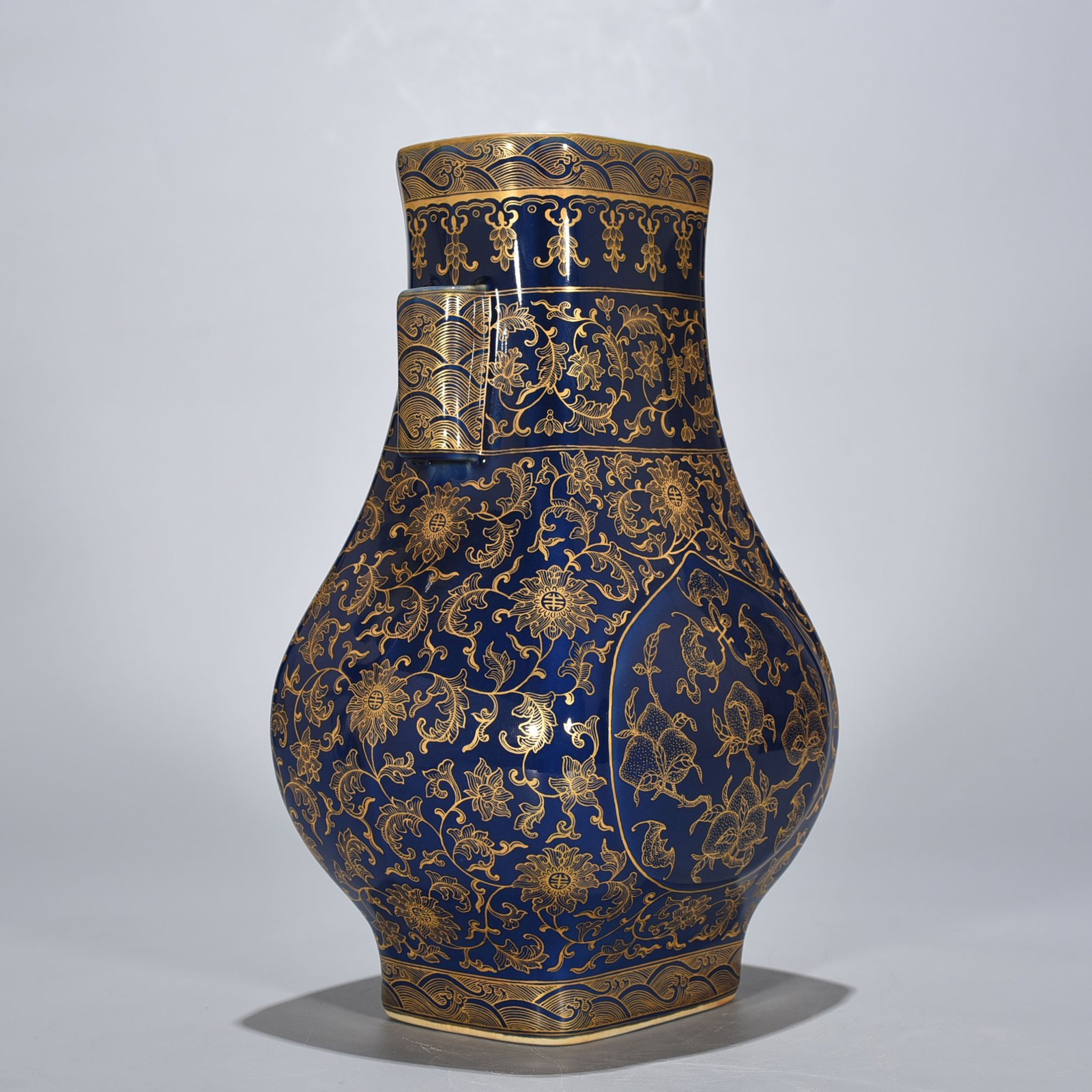 Qing Dynasty Qianlong Festival blue-glazed gold-painted five-blessing holder apricot round ears square vase