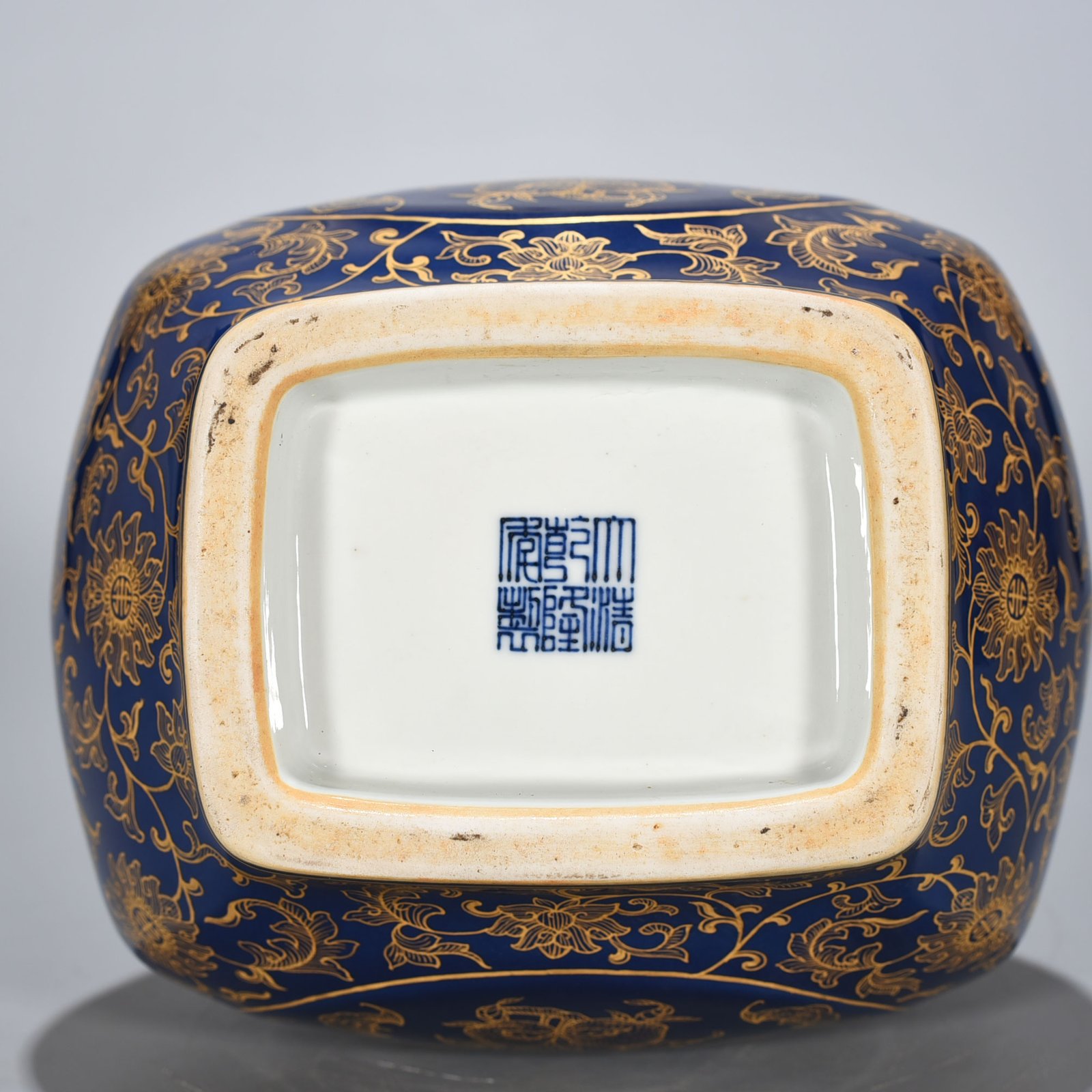 Qing Dynasty Qianlong Festival blue-glazed gold-painted five-blessing holder apricot round ears square vase