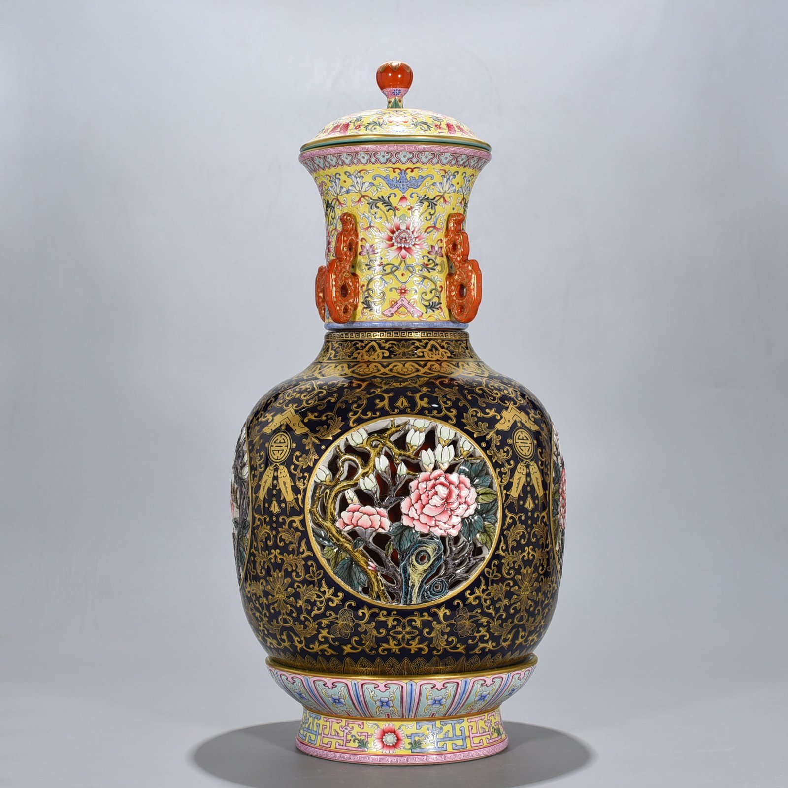 Qing Dynasty Qianlong Festival blue glaze painted gold hollow four seasons flower pattern revolving vase