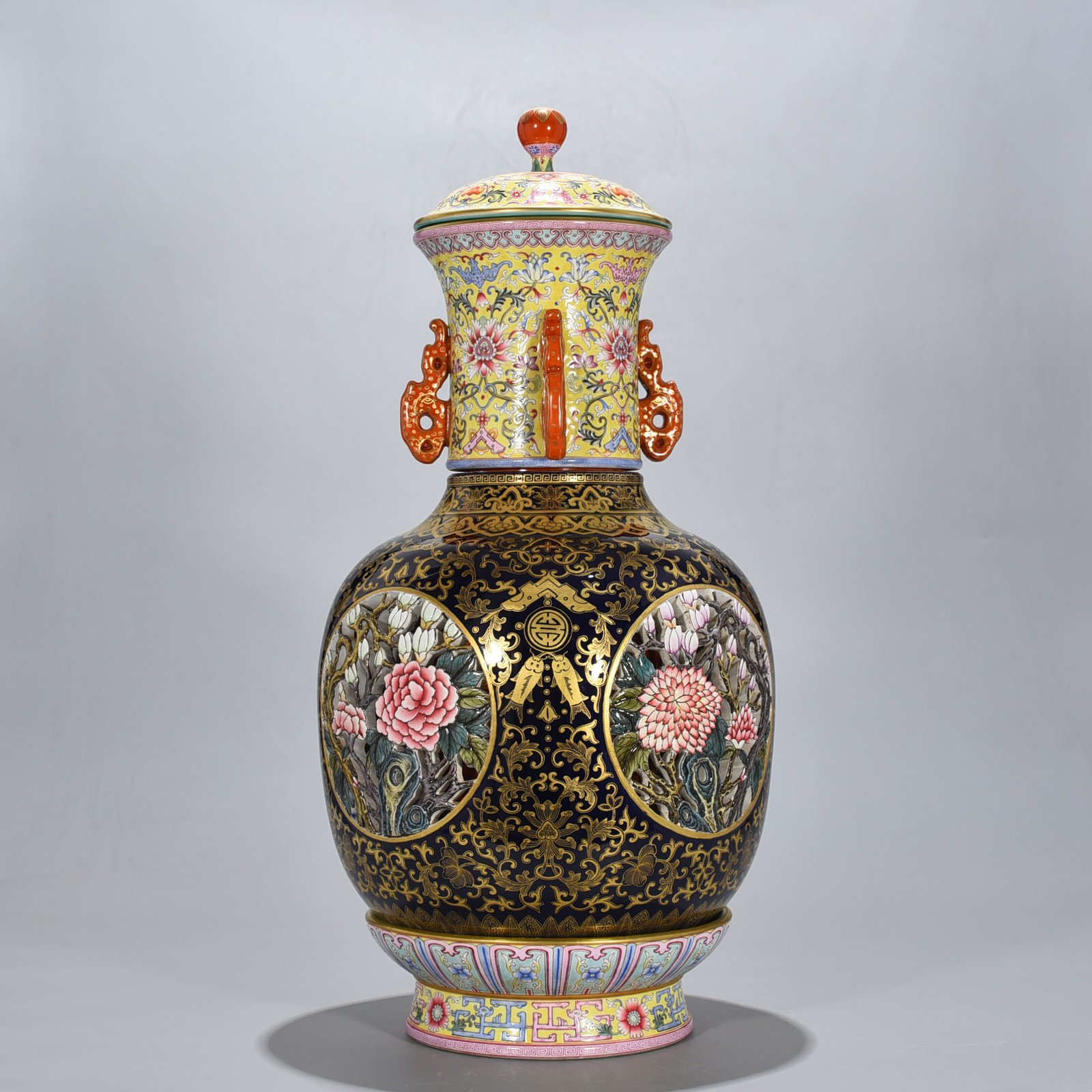 Qing Dynasty Qianlong Festival blue glaze painted gold hollow four seasons flower pattern revolving vase