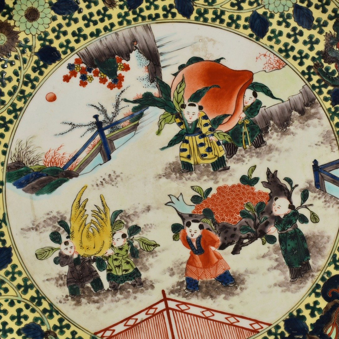 Qing Dynasty Qianlong pastel Sanduo doll pattern plate