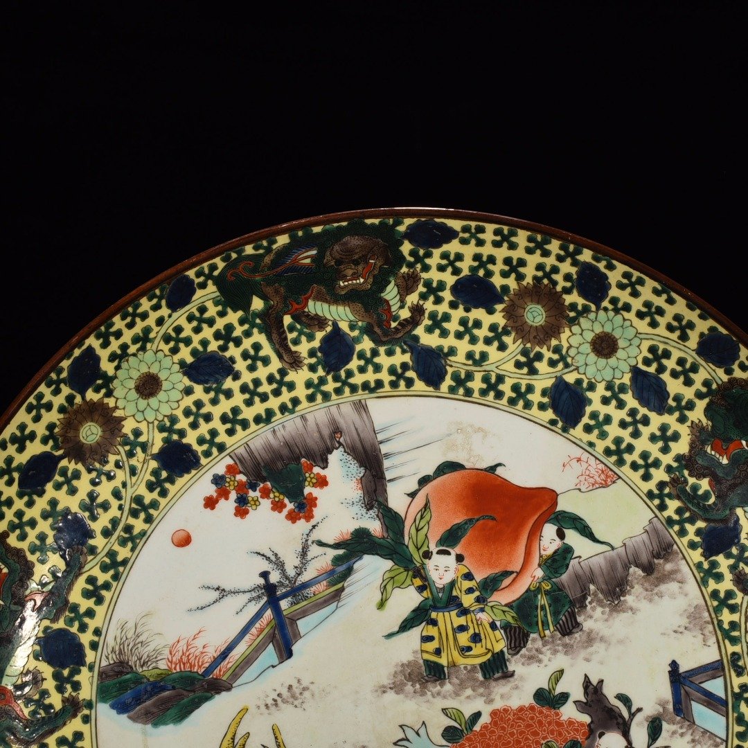 Qing Dynasty Qianlong pastel Sanduo doll pattern plate