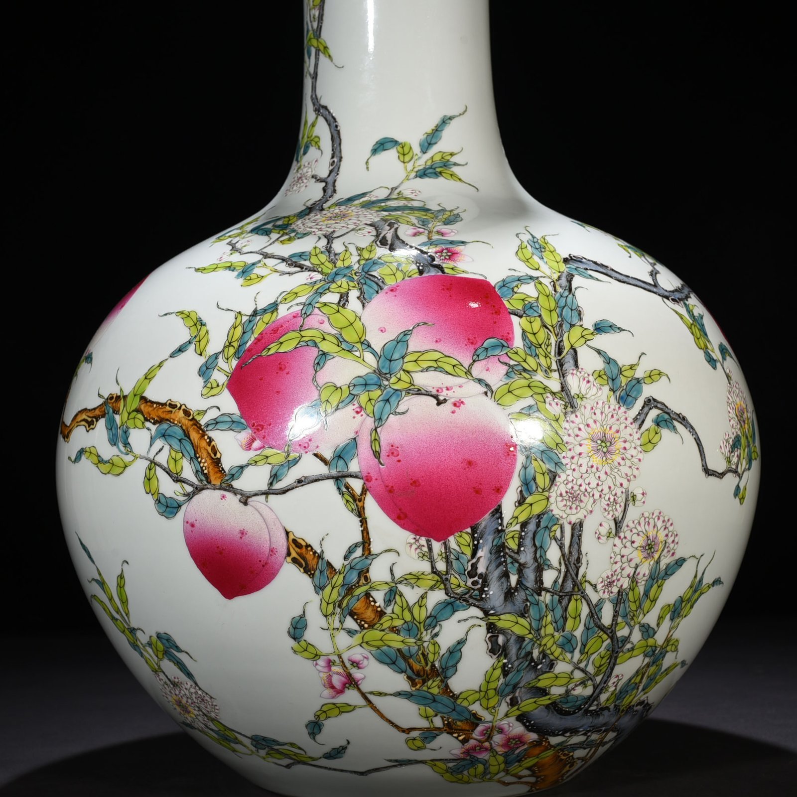 Qing Dynasty Qianlong famille rose nine-peach pattern celestial sphere vase