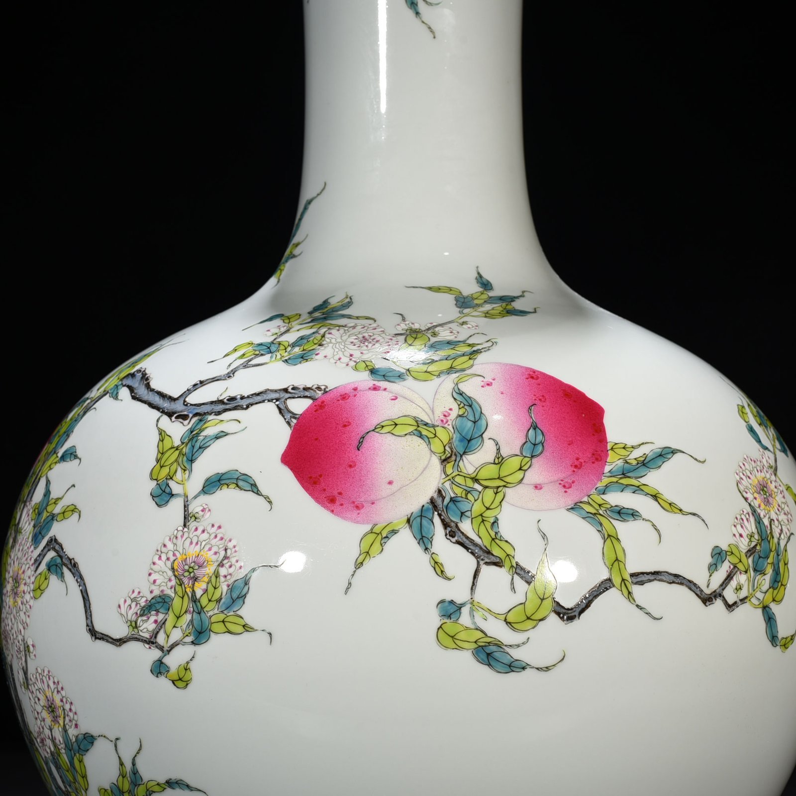 Qing Dynasty Qianlong famille rose nine-peach pattern celestial sphere vase