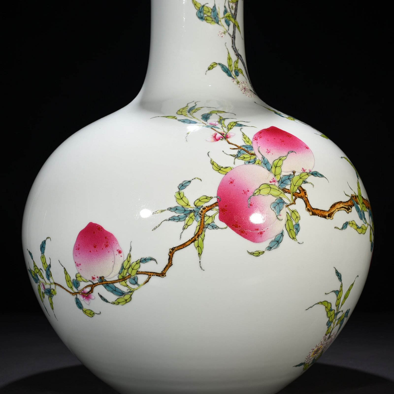 Qing Dynasty Qianlong famille rose nine-peach pattern celestial sphere vase