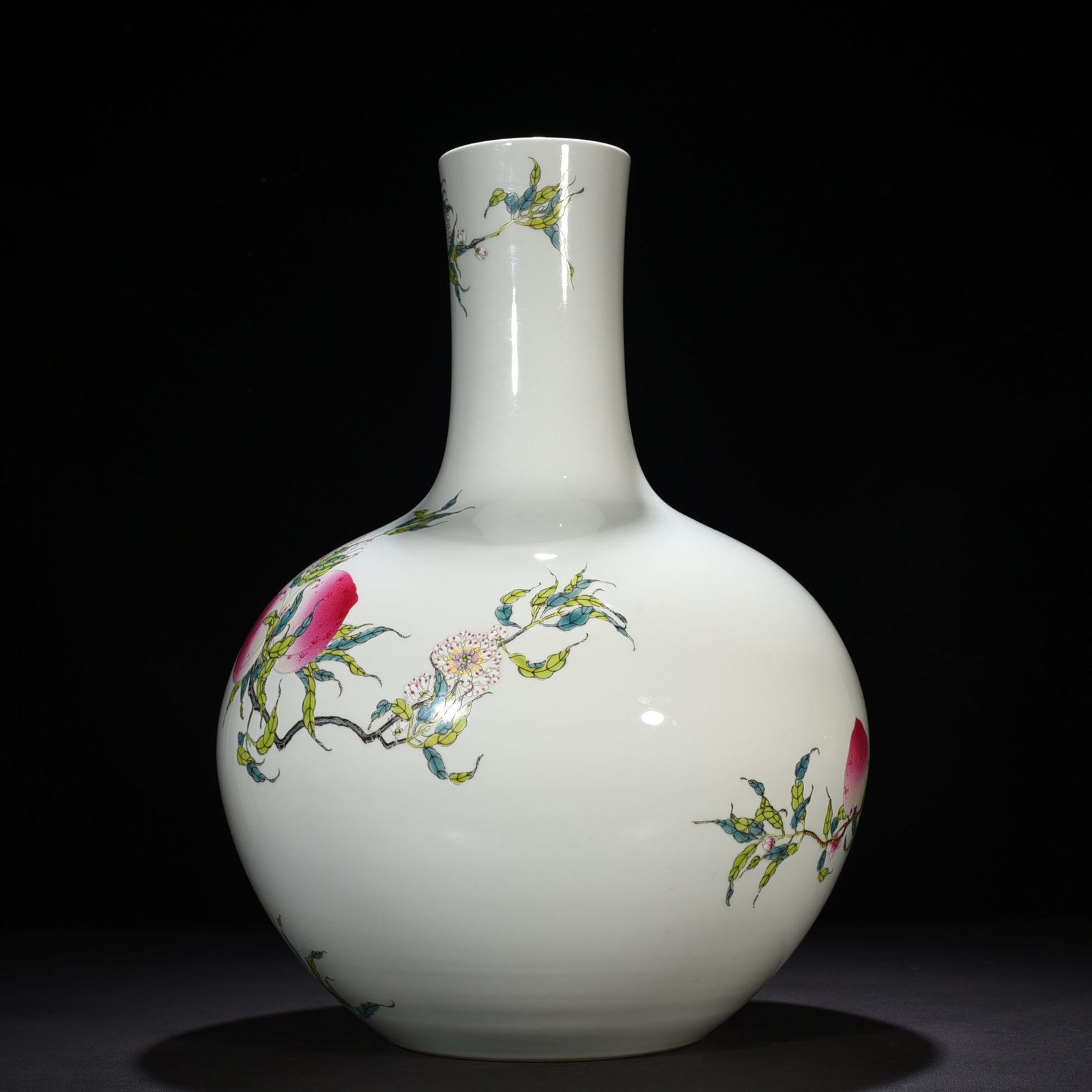 Qing Dynasty Qianlong famille rose nine-peach pattern celestial sphere vase