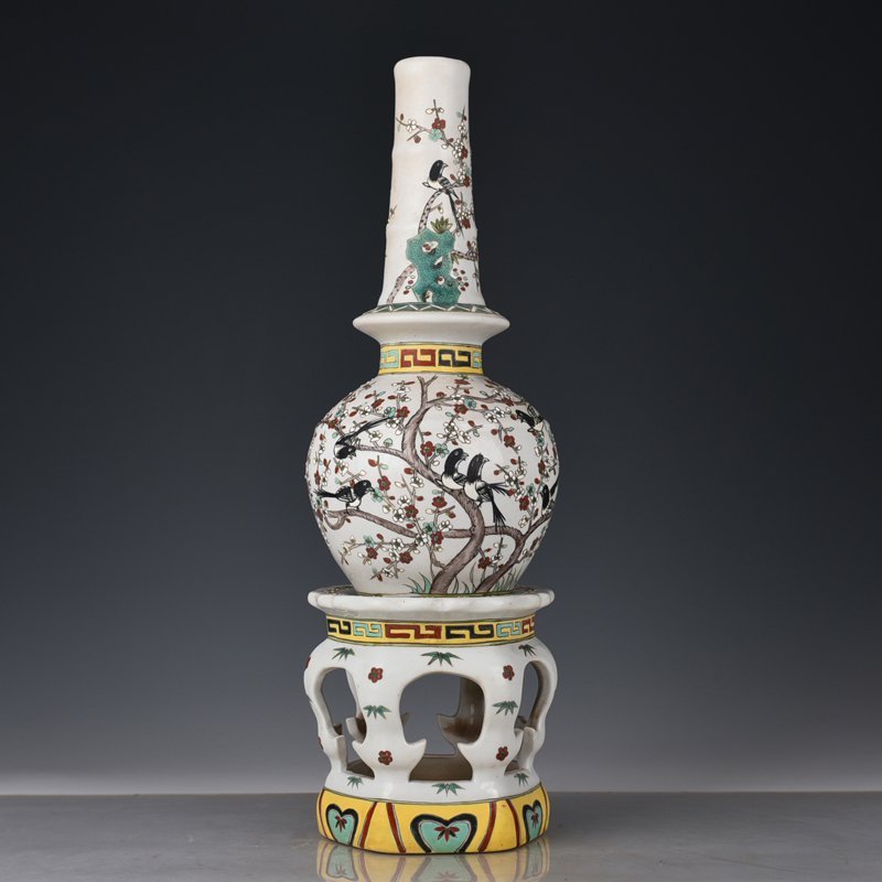 Qing Dynasty Qianlong pastel magpie and plum blossom vase