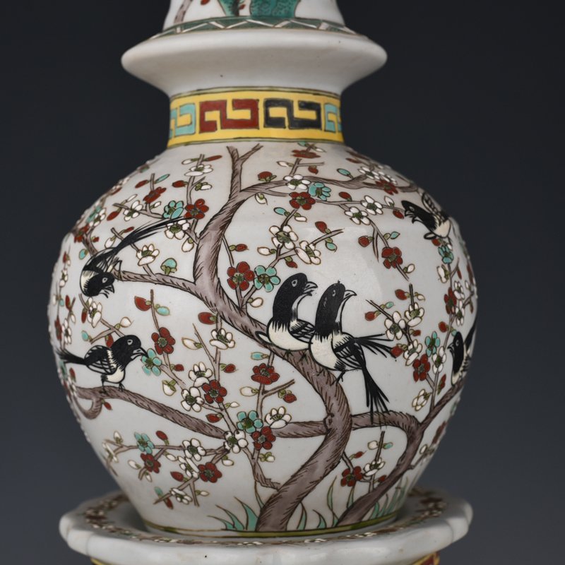 Qing Dynasty Qianlong pastel magpie and plum blossom vase