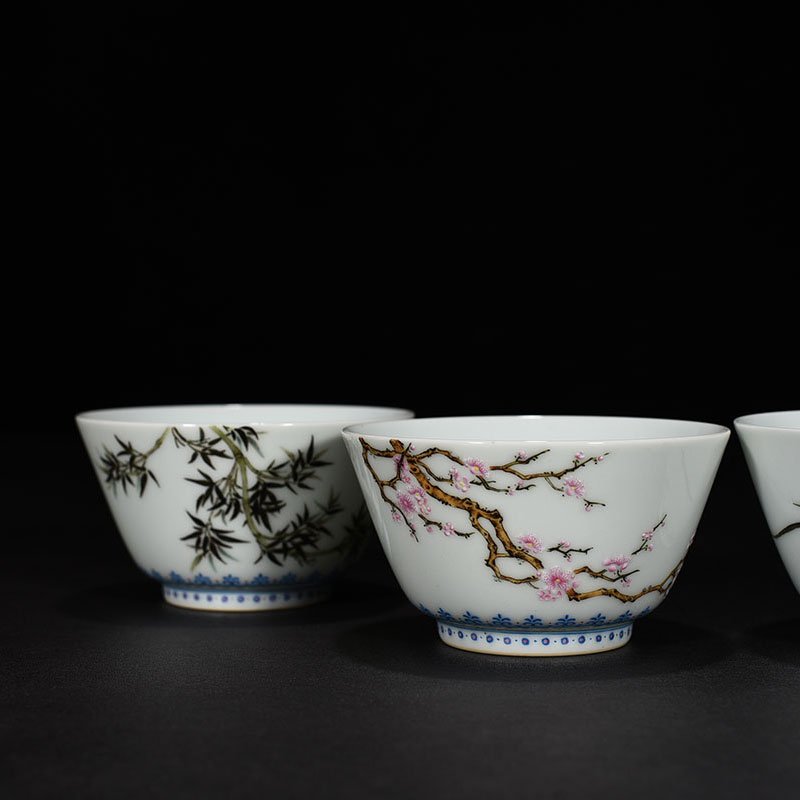 Qing Dynasty Qianlong pastel plum  orchid  bamboo and chrysanthemum cup