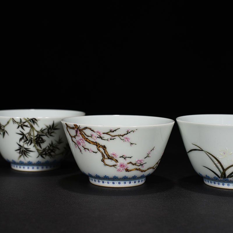 Qing Dynasty Qianlong pastel plum  orchid  bamboo and chrysanthemum cup