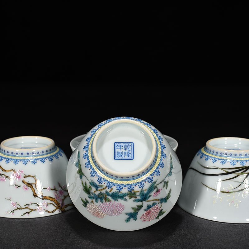 Qing Dynasty Qianlong pastel plum  orchid  bamboo and chrysanthemum cup