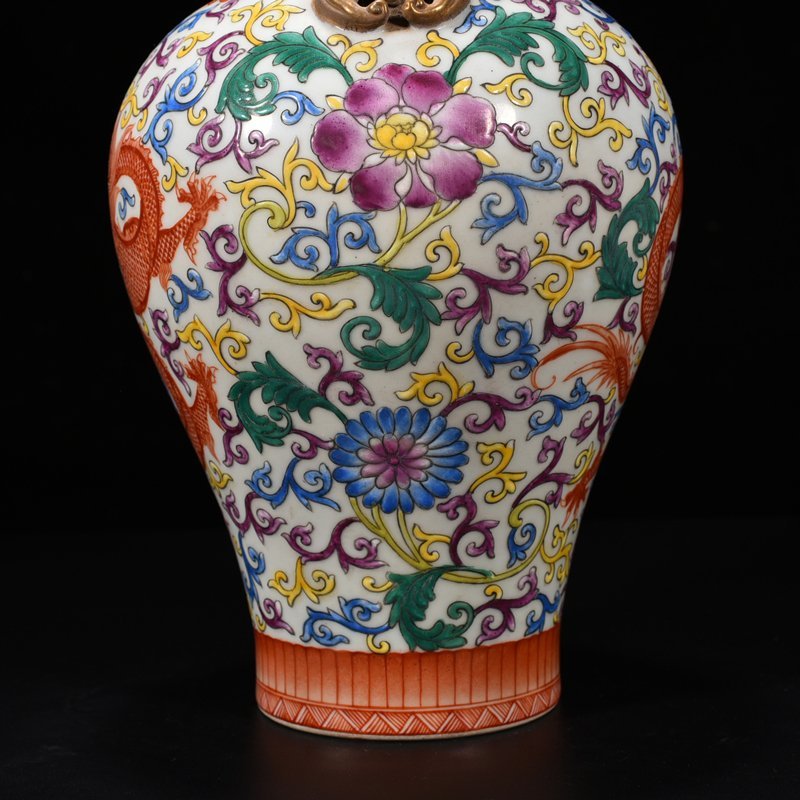 Qing Dynasty Qianlong famille rose double-eared plum vase