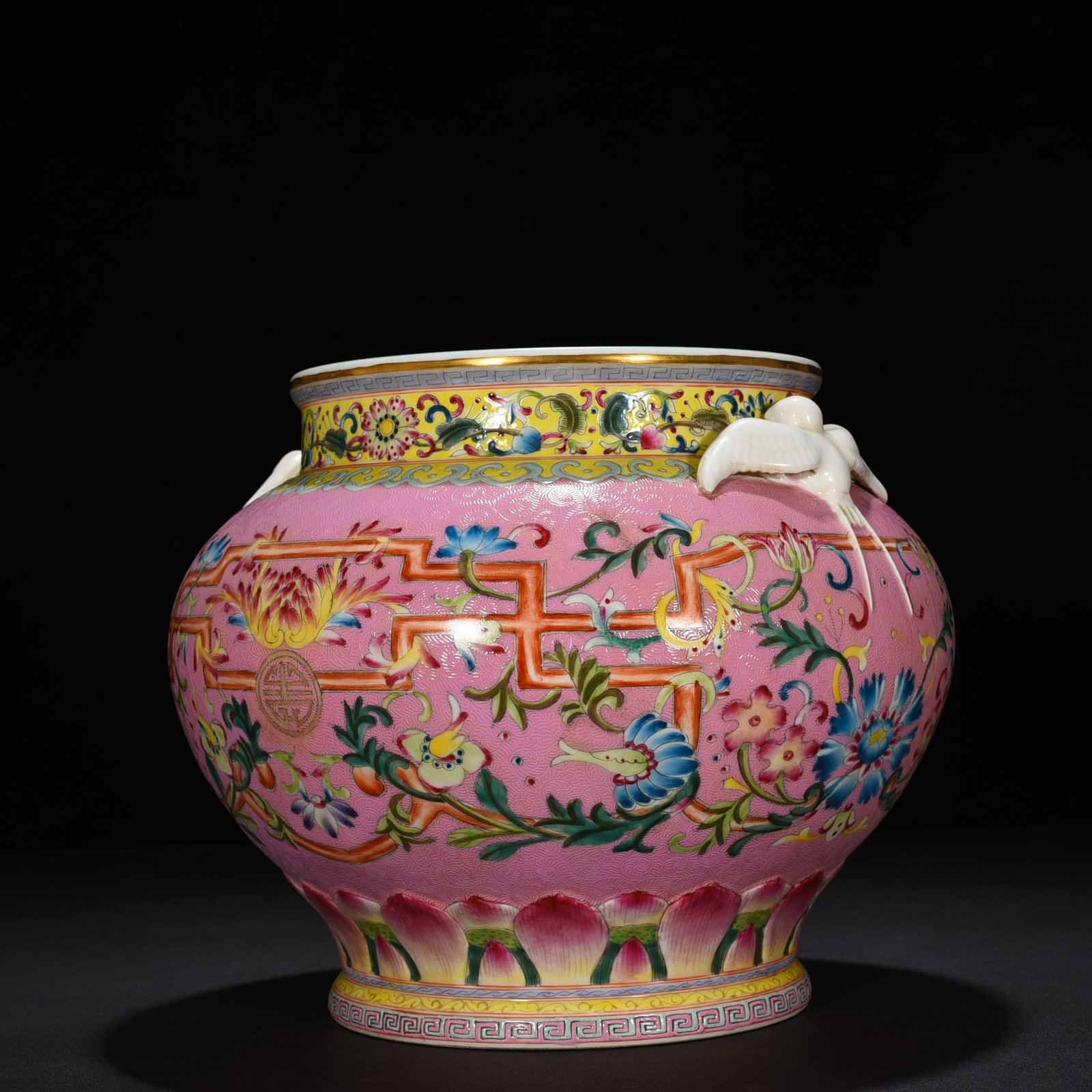 Qing Dynasty Qianlong period of the pink ground-rolled famille rose flower pattern swallow jar