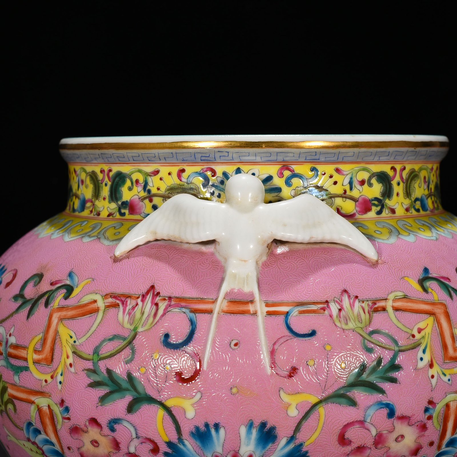 Qing Dynasty Qianlong period of the pink ground-rolled famille rose flower pattern swallow jar