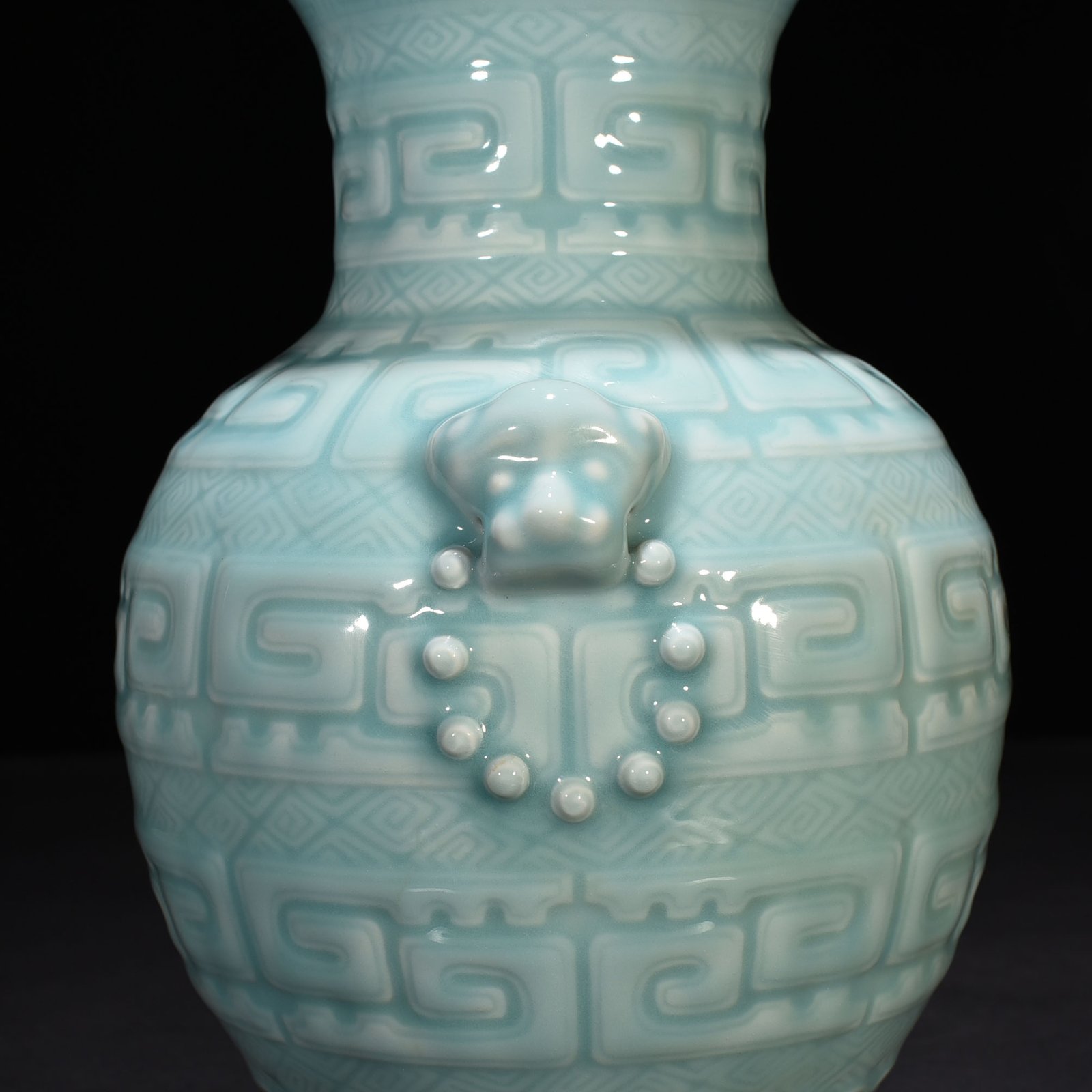Qing Dynasty Qianlong pink celadon glazed animal ear vase