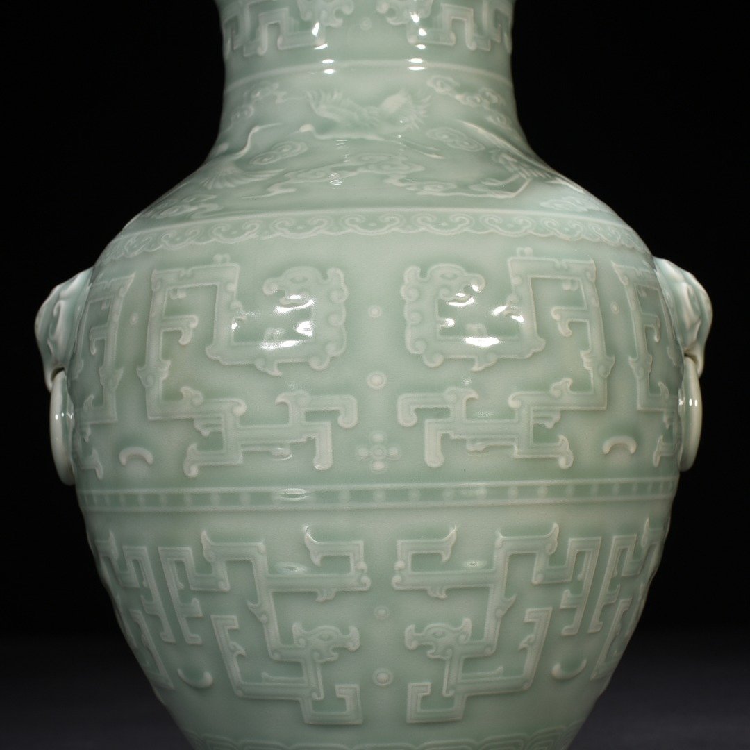 Qing Dynasty Qianlong pink celadon glaze engraved chilong pattern vase