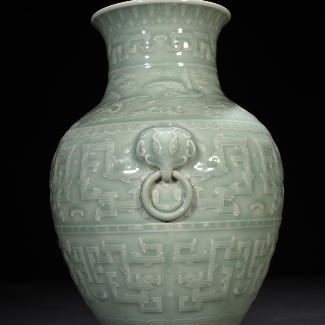 Qing Dynasty Qianlong pink celadon glaze engraved chilong pattern vase
