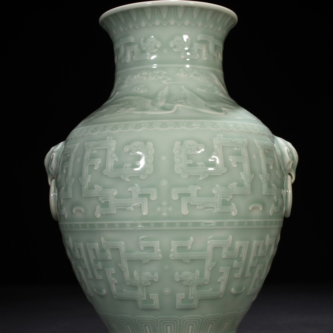 Qing Dynasty Qianlong pink celadon glaze engraved chilong pattern vase