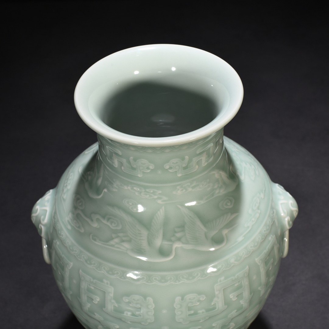 Qing Dynasty Qianlong pink celadon glaze engraved chilong pattern vase