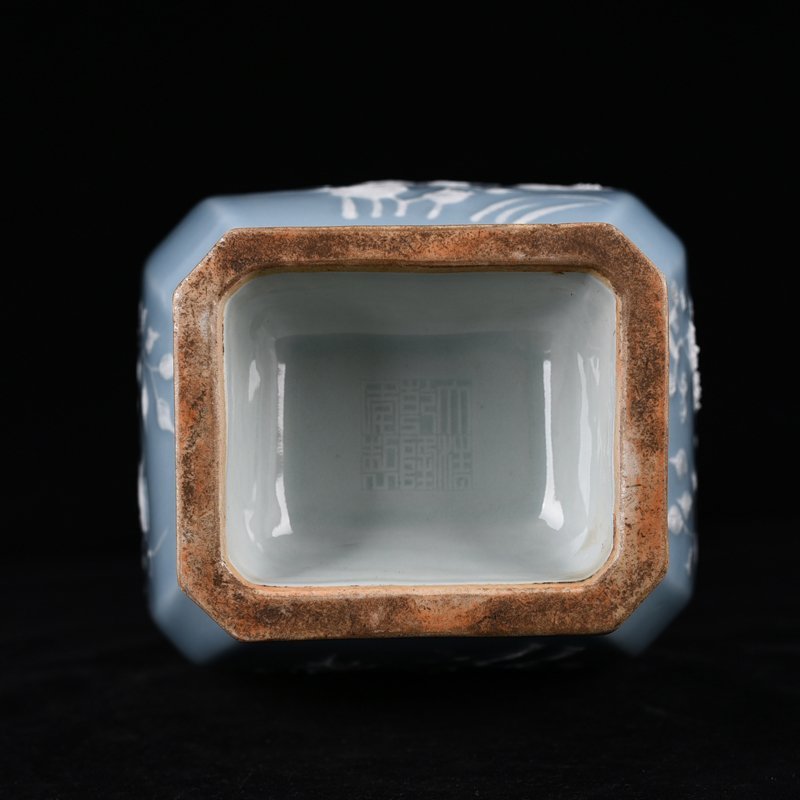 Qing Dynasty Qianlong pink celadon glaze square vase with carved floral patterns