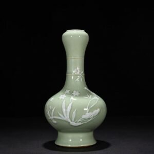 Qing Dynasty Qianlong pink celadon glaze garlic vase with carved flower