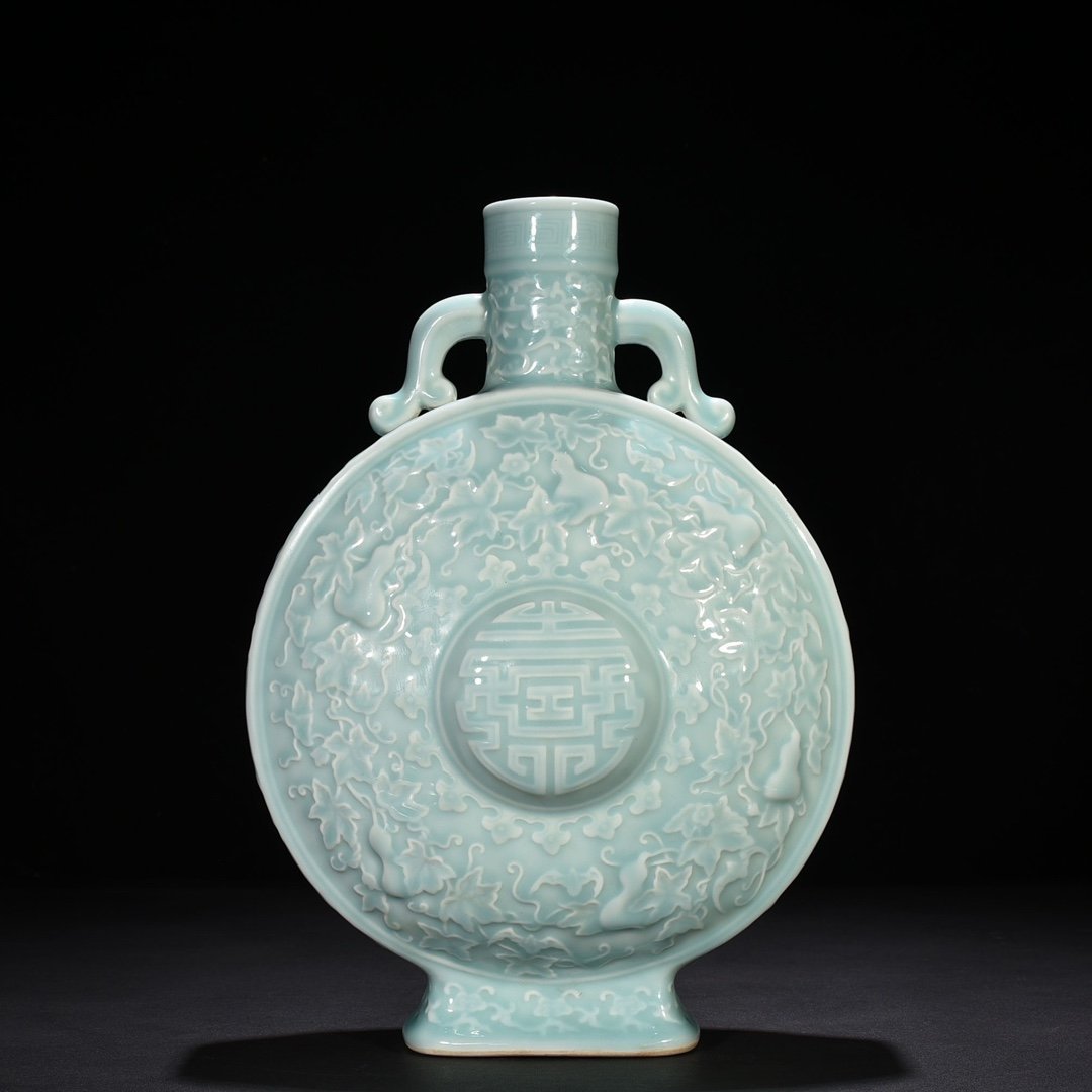 Qing Dynasty Qianlong pink celadon glaze descendants all generations holding moon vase