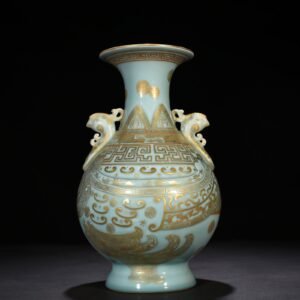 Qing Dynasty Qianlong pink celadon glaze with gold phoenix ear statue