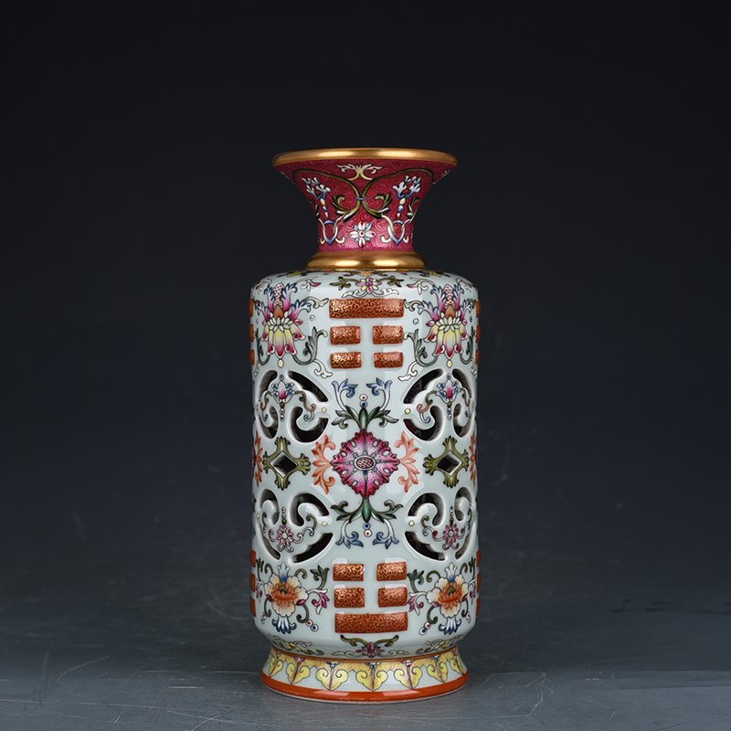 Qing Dynasty Qianlong pink celadon enamel flower hollow bagua vase
