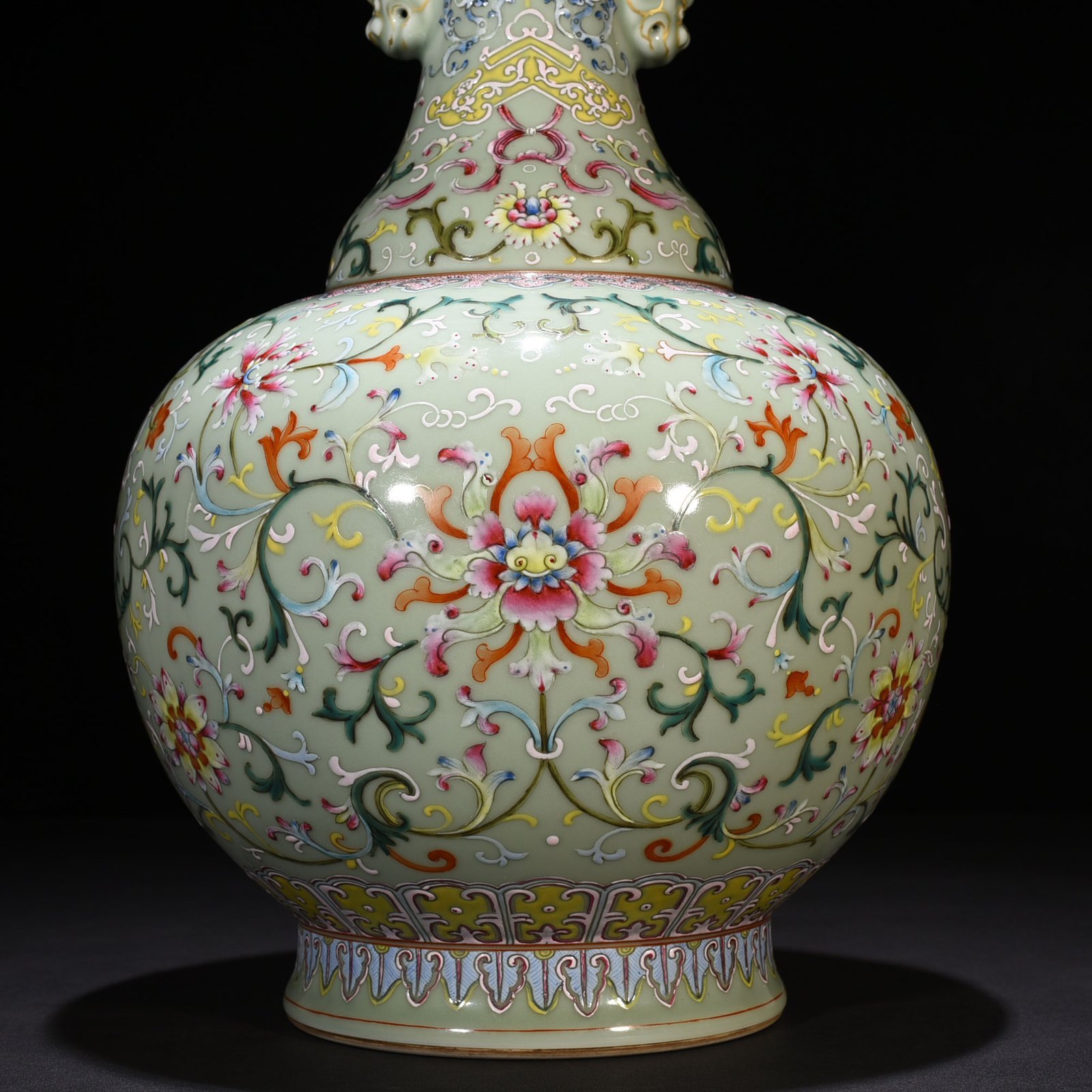 Qing Dynasty Qianlong pink celadon glaze pastel wrapped branch flower pattern animal ear disc mouth vase