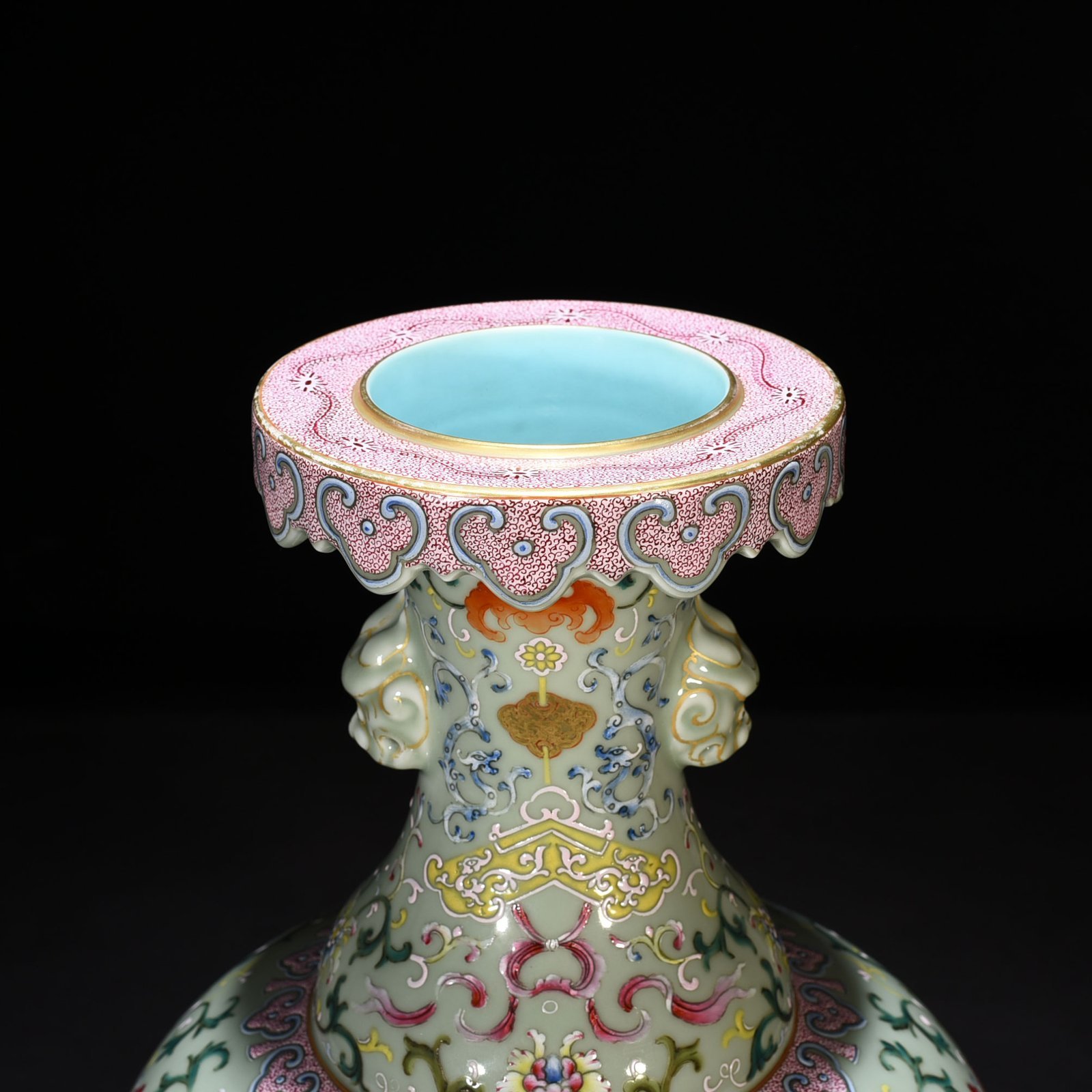 Qing Dynasty Qianlong pink celadon glaze pastel wrapped branch flower pattern animal ear disc mouth vase