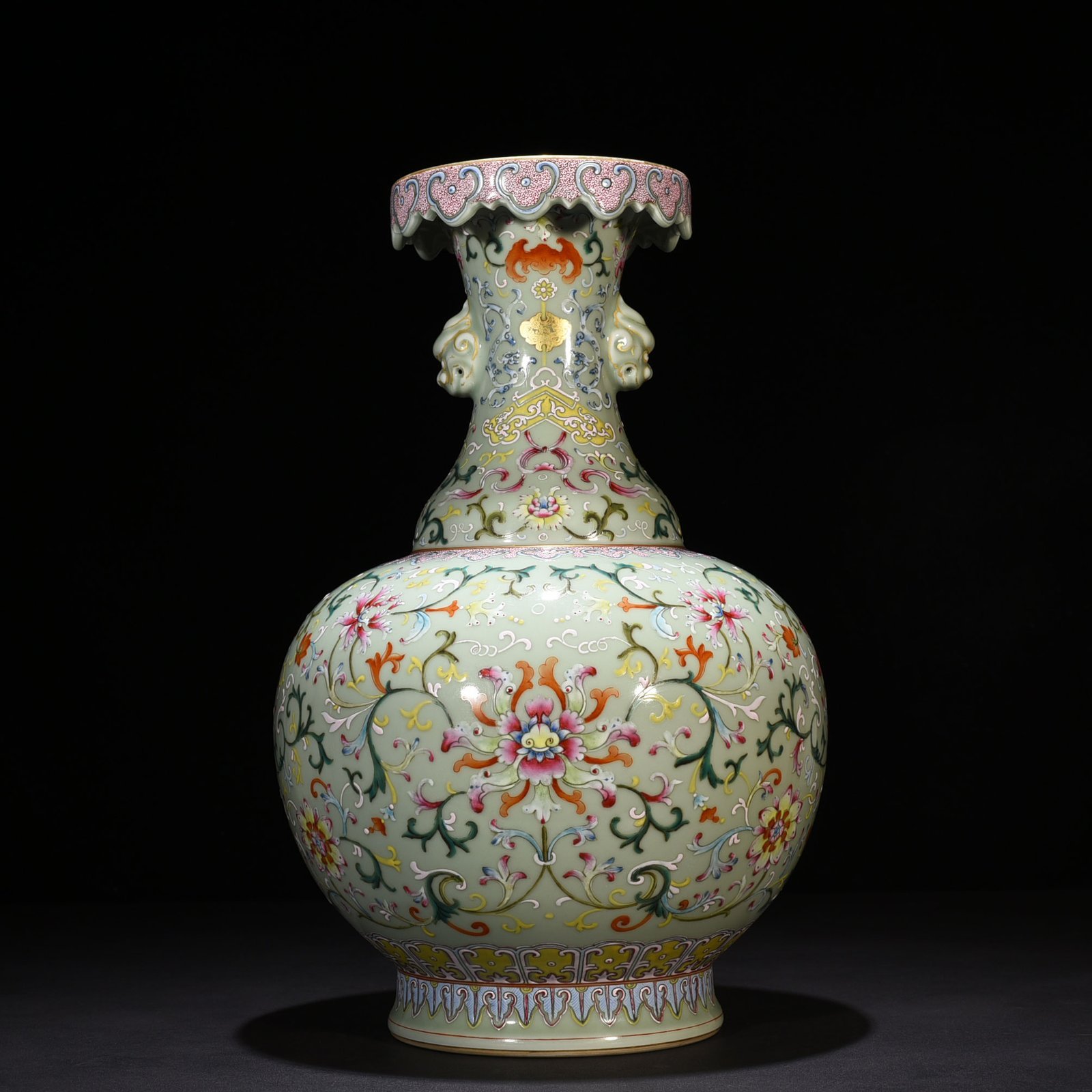 Qing Dynasty Qianlong pink celadon glaze pastel wrapped branch flower pattern animal ear disc mouth vase