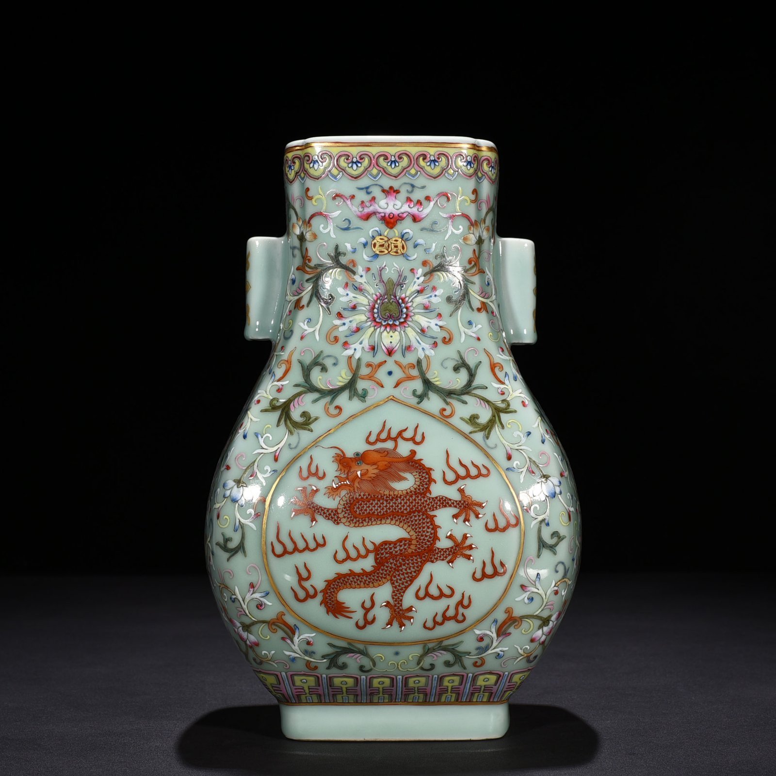 Qing Dynasty Qianlong pink celadon glaze pastel flower window alum red gold dragon pattern penetrating square vase