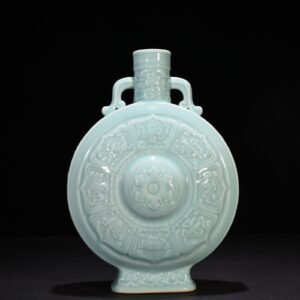 Qing Dynasty Qianlong pink celadon glaze carved eight-treasure pattern moon bottle flat bottle