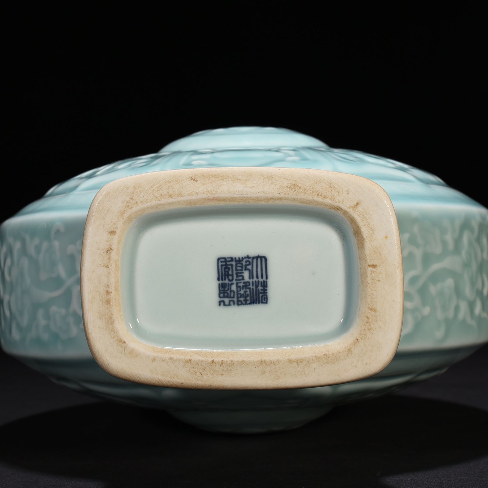 Qing Dynasty Qianlong pink celadon glaze carved eight-treasure pattern moon bottle flat bottle