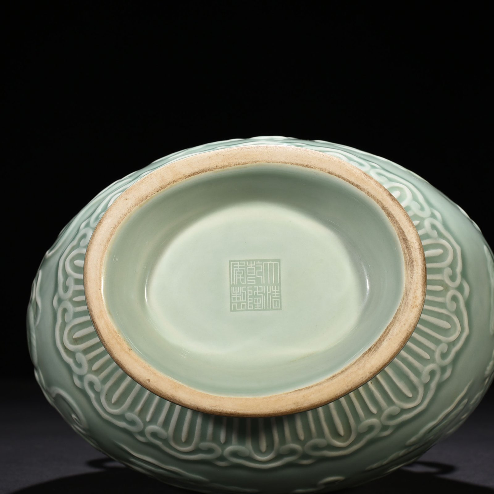 Qing Dynasty Qianlong pink celadon glaze carved lion rolling hydrangea amphora