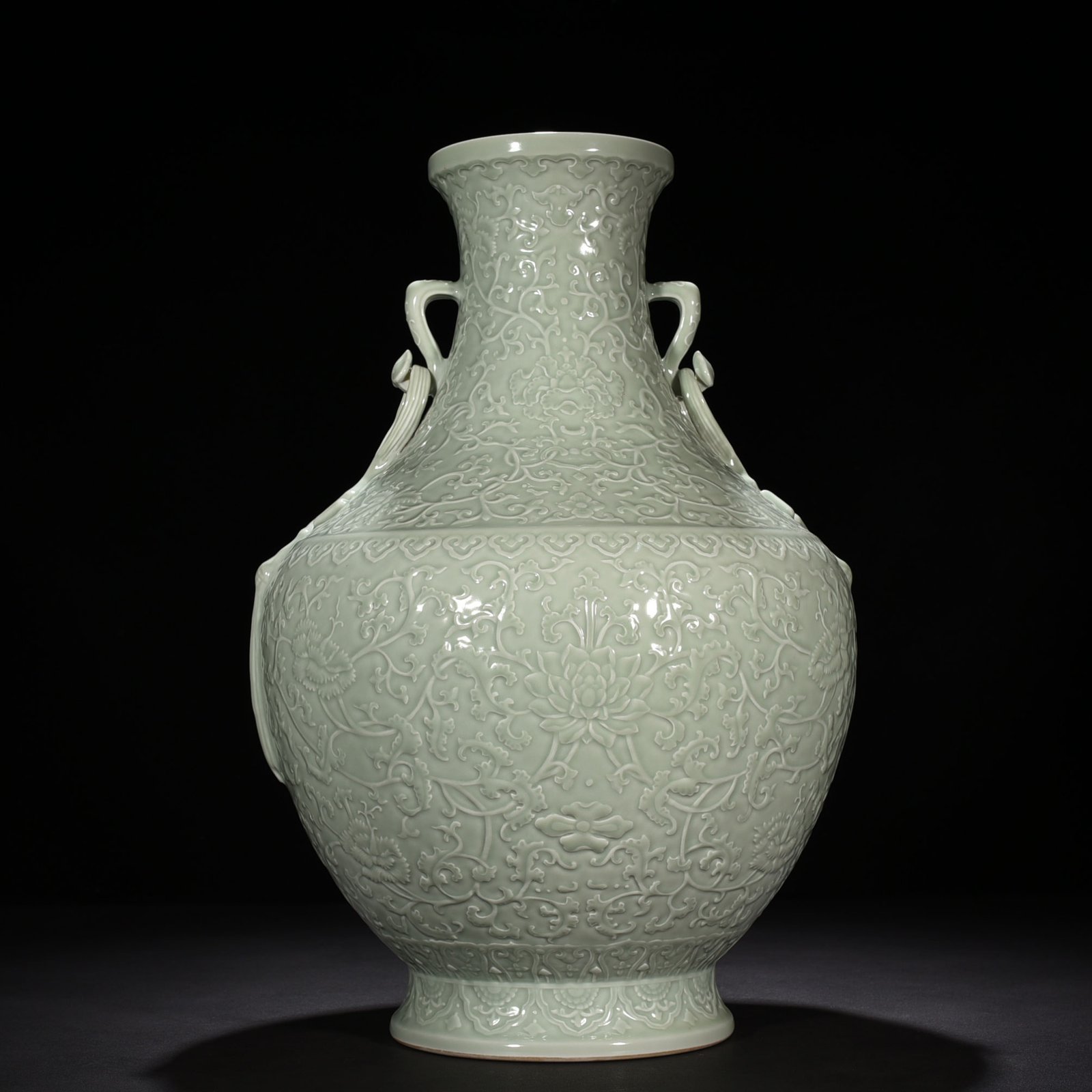 Qing Dynasty Qianlong pink celadon glaze carved tangled flower pattern Ruyi ear vase