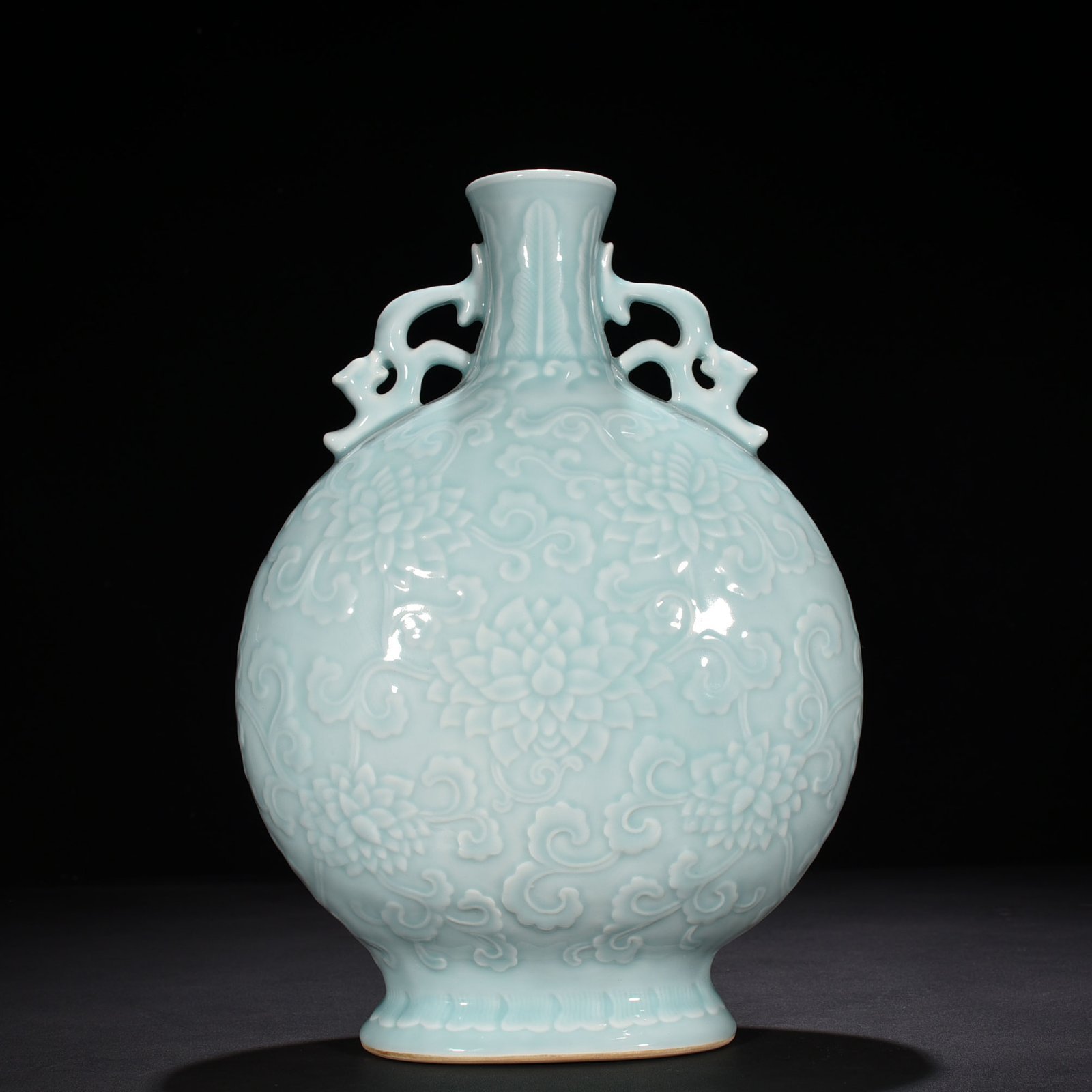 Qing Dynasty Qianlong pink celadon glaze flat vase with carved floral patterns