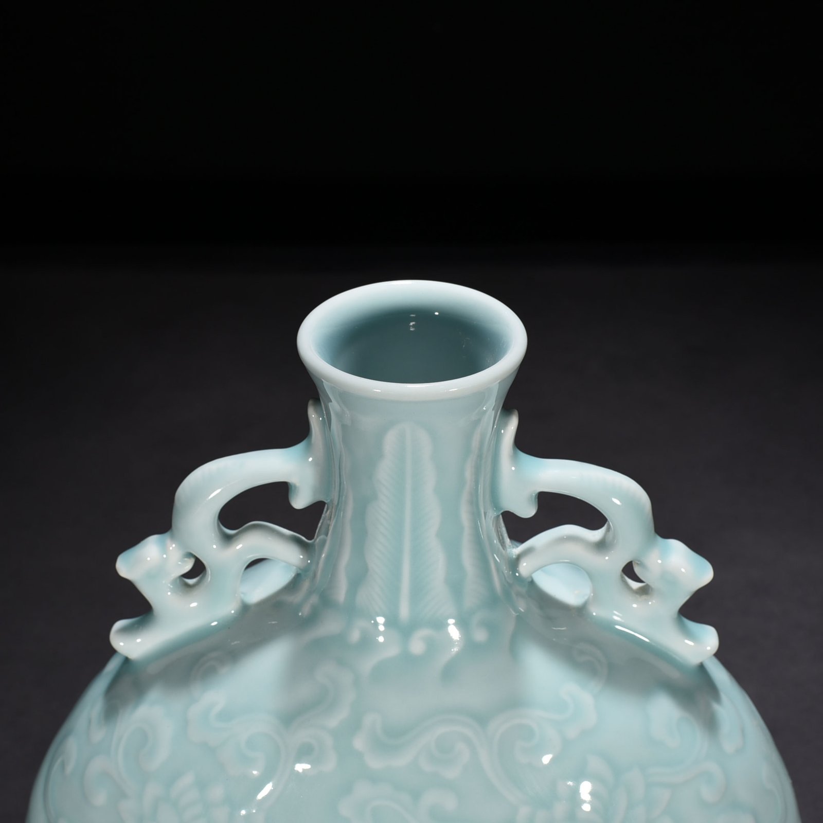 Qing Dynasty Qianlong pink celadon glaze flat vase with carved floral patterns