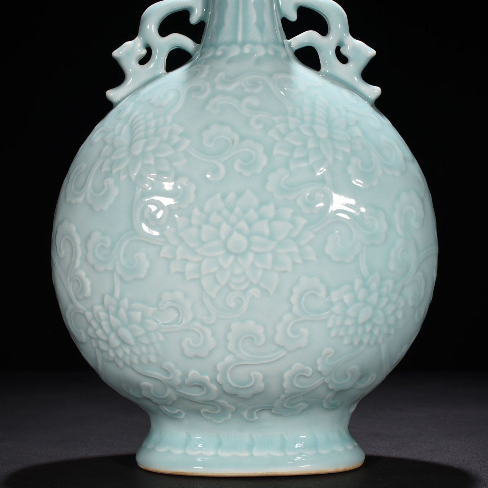 Qing Dynasty Qianlong pink celadon glaze flat vase with carved floral patterns