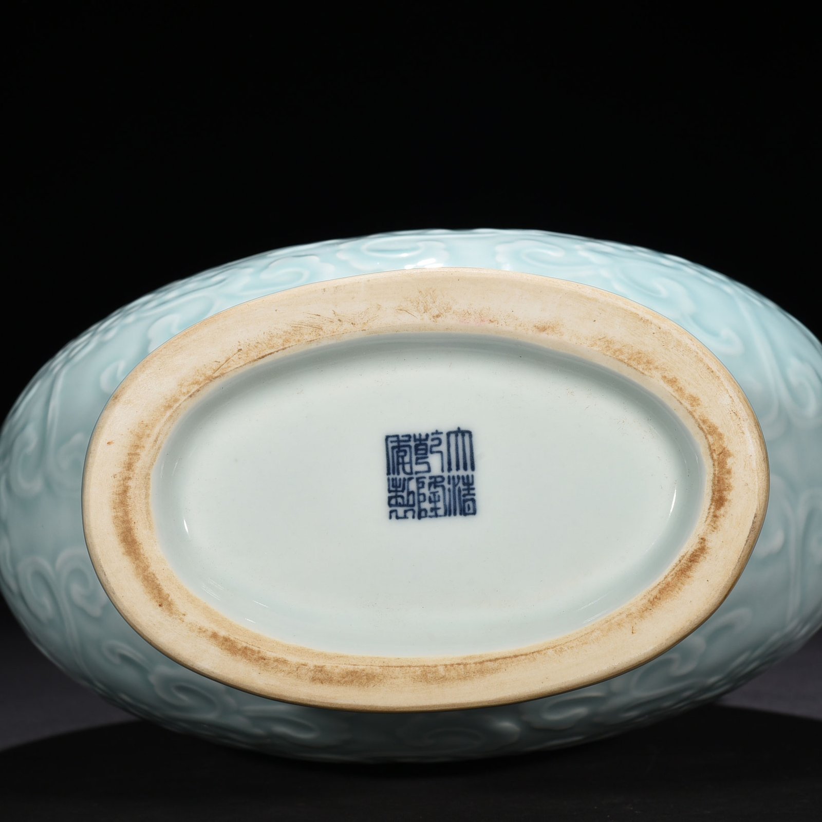 Qing Dynasty Qianlong pink celadon glaze flat vase with carved floral patterns