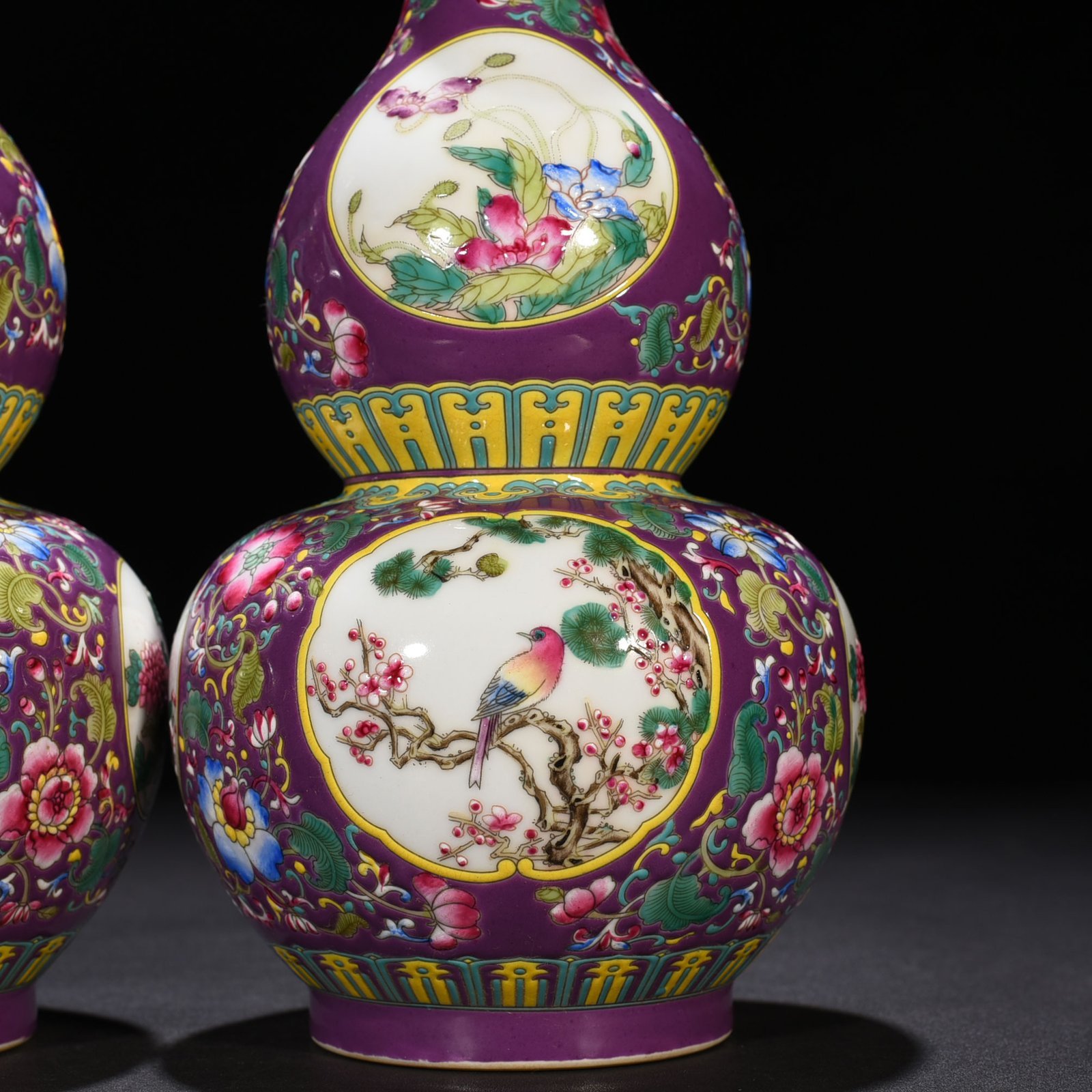 Qing Dynasty Qianlong purple ground enamel gourd vase with window and flower