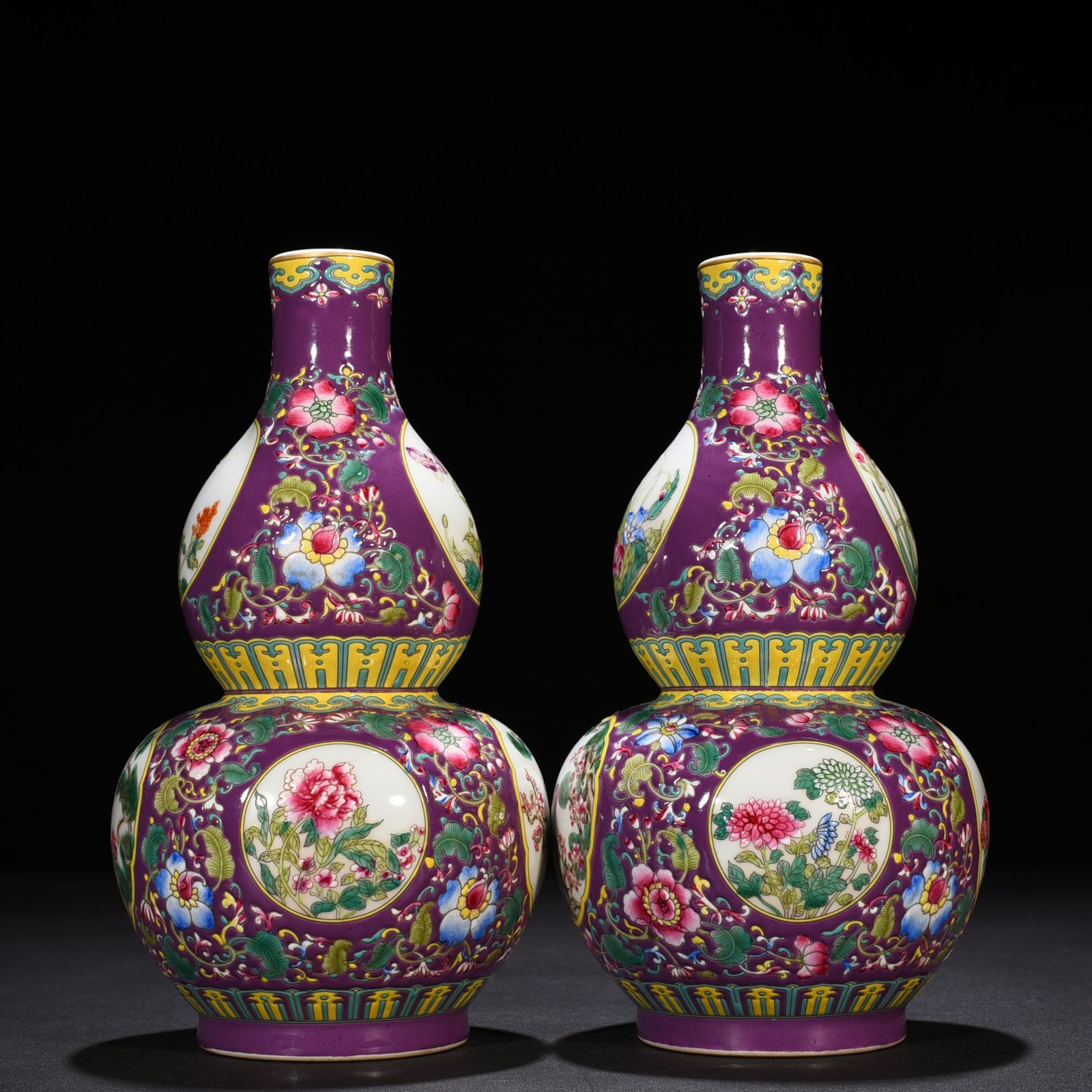 Qing Dynasty Qianlong purple ground enamel gourd vase with window and flower