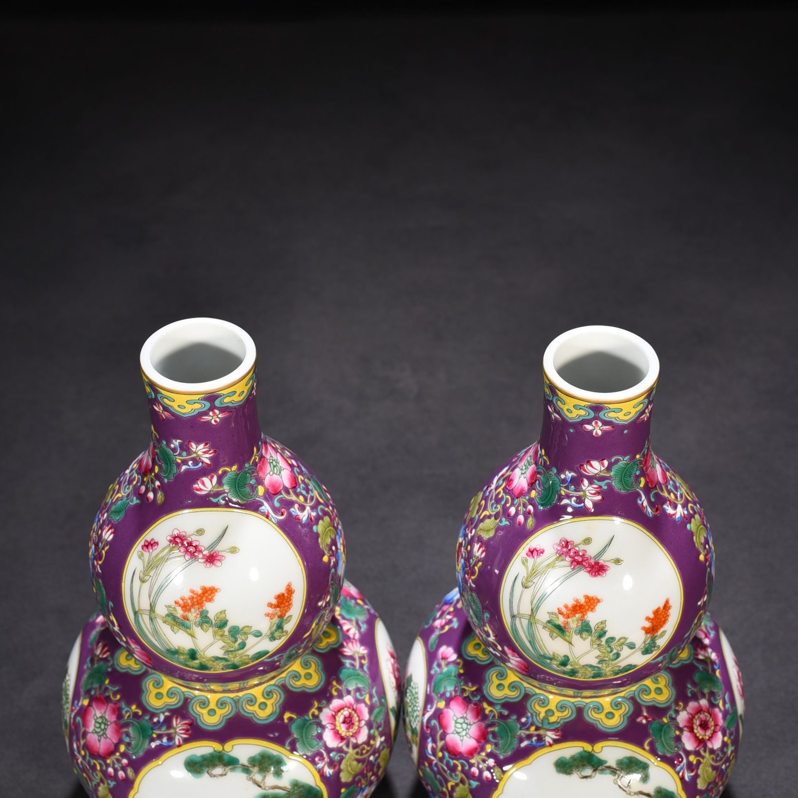 Qing Dynasty Qianlong purple ground enamel gourd vase with window and flower