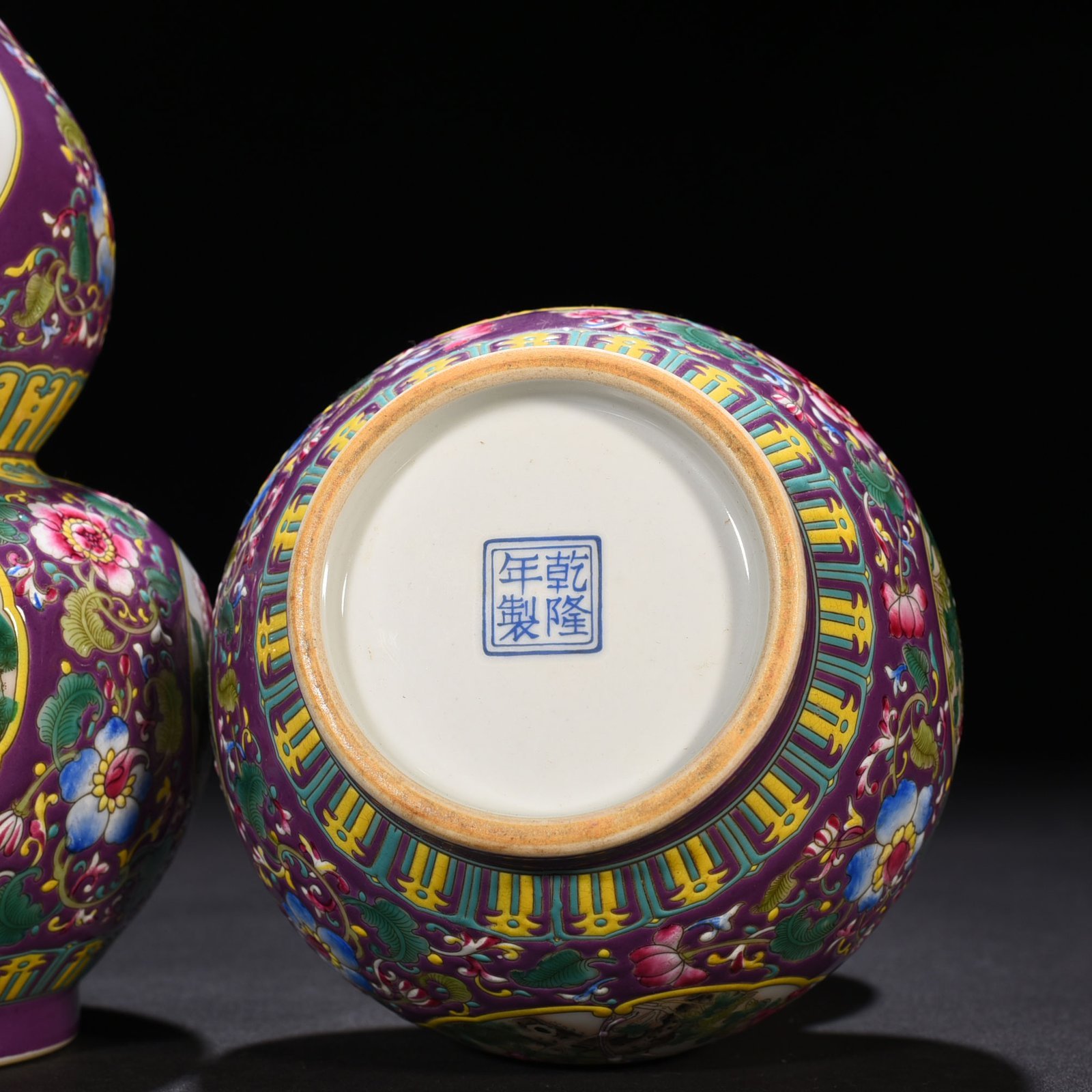 Qing Dynasty Qianlong purple ground enamel gourd vase with window and flower