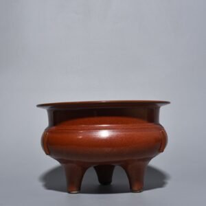 Qing Dynasty Qianlong Purple gold-glazed three-legged furnace