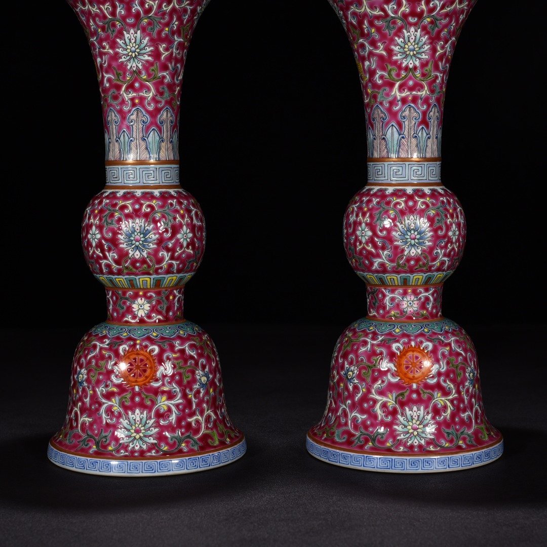 Qing Dynasty Qianlong red ground pastel lotus eight-treasure flower goblet