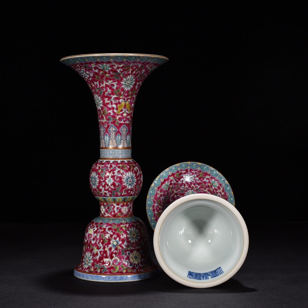 Qing Dynasty Qianlong red ground pastel lotus eight-treasure flower goblet