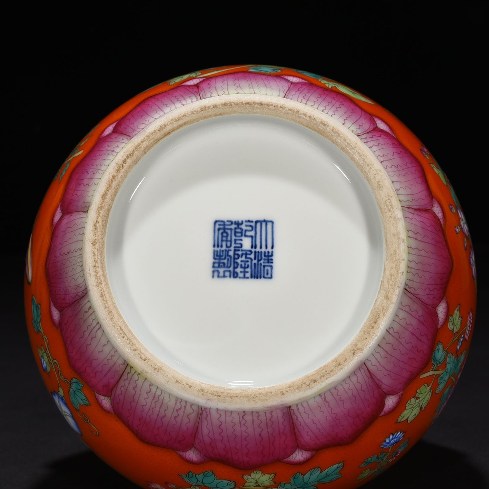 Qing Dynasty Qianlong red ground pastel butterfly love pattern Ruyi ear garlic vase