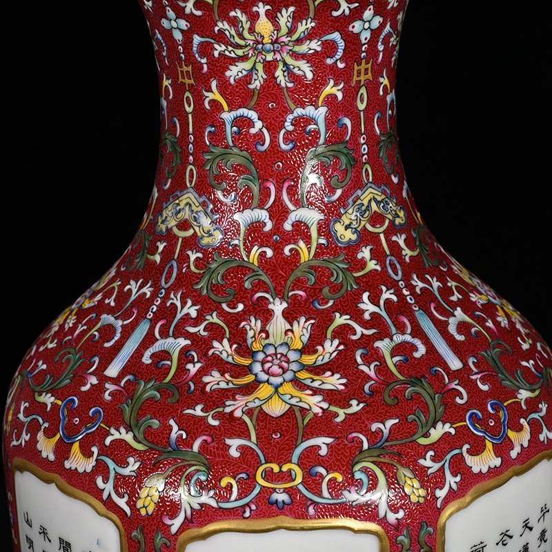 Qing Dynasty Qianlong red ground rolling road consecrated four seasons flower verse pattern vase