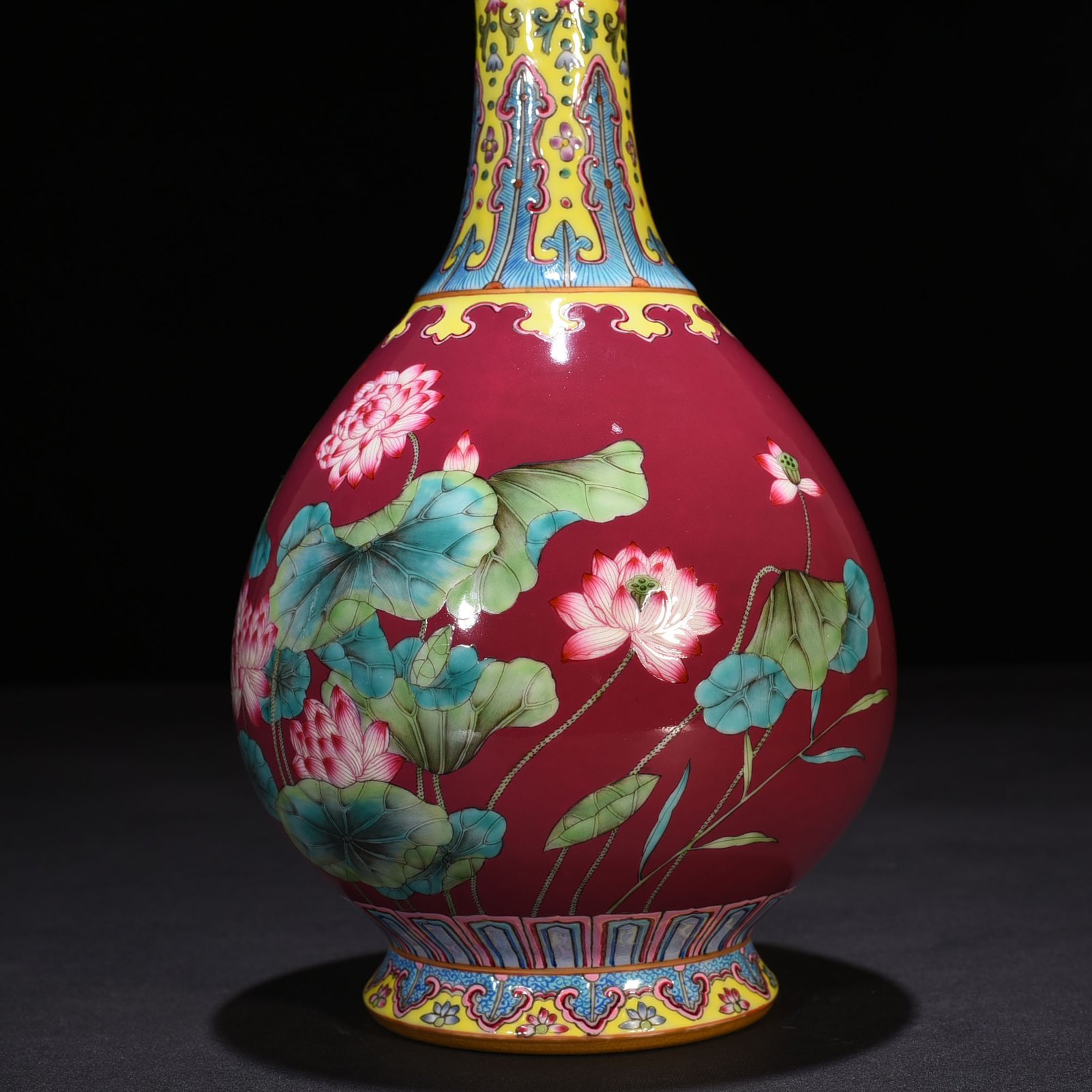 Qing Dynasty Qianlong rouge red ground enamel garlic vase with lotus pattern
